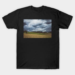 Stormy cloudscape over fields and pasture T-Shirt